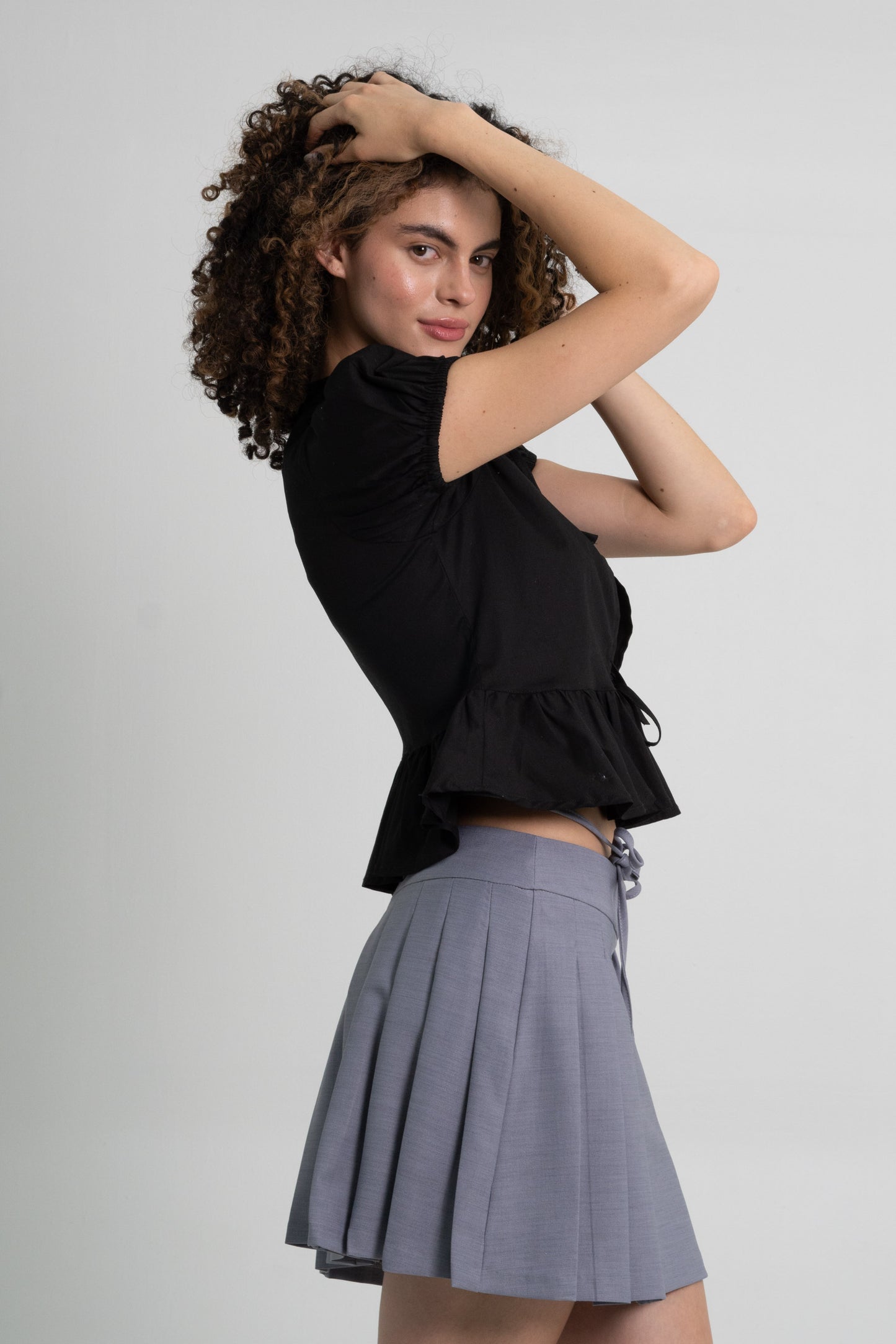 BLUSA PEPLUM LAZO COQUETTE